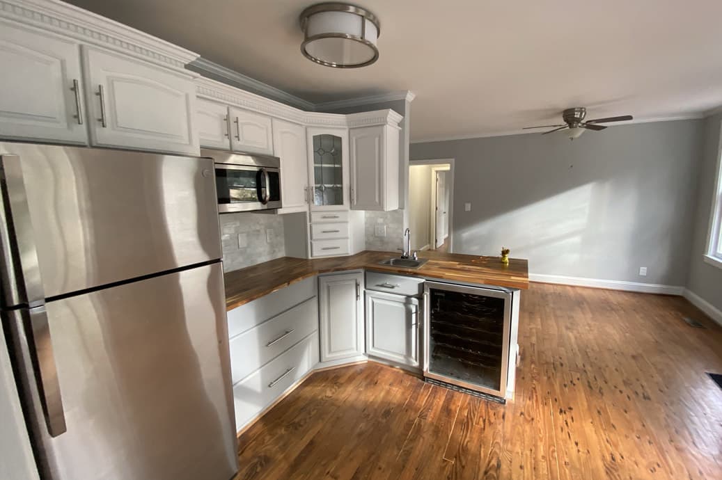 Completed Allison Builders kitchen with warm timber counters